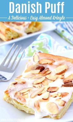 a close up of a plate of food with almonds on it and a fork