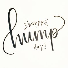 the words happy hump day are written in black ink on a white paper background