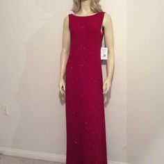 Bright Red Floor Length Gown With Sparkles Overall; Shimmery, Sexy, Shapely & Sleeveless ; Deep Scoop Back; Perfect For A Formal Night Out; Comfortable. 10%Spandex; 58"Length & 13" Shoulders. Nwt; Size 12 Fitted Embellished Red Maxi Dress, Red Embellished Fitted Maxi Dress, Fitted Red Embellished Maxi Dress, Fitted Embellished Gown For Red Carpet, Embellished Fitted Gown For Red Carpet, Embellished Red Maxi Dress, Red Sequin Sleeveless Gown, Sleeveless Evening Dress For Red Carpet And Holiday, Sleeveless Evening Dress For Red Carpet Holiday