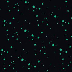 green stars are flying in the dark sky