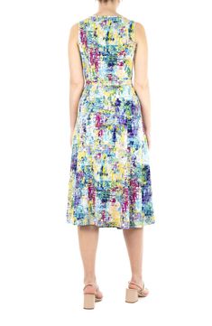 A pretty printed midi dress features a tie waist and a flattering A-line silhouette for feminine style. Crew neck Sleeveless Slips on over head Allover print Waist tie sash A-line Stretch crepe construction 95% polyester, 5% spandex Machine wash cold, tumble dry low Imported Model’s stats for sizing: 5’11” height, 32” bust, 25” waist, 35” hips. Sleeveless Printed Midi Dress For Spring, Spring Sleeveless Printed Midi Dress, Printed Sleeveless Midi Dress For Spring, Sleeveless Multicolor Sundress Midi Dress, Multicolor Print Sleeveless Midi Sundress, Spring Printed Sleeveless Midi Dress, Sleeveless Midi Dress In Multicolor Abstract Print, Patterned Midi Dress For Summer, Sleeveless Midi Dress With Multicolor Abstract Print