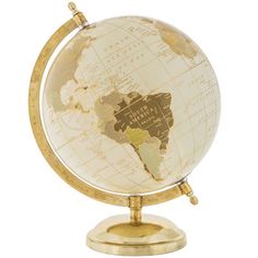 a small white and gold globe on a stand