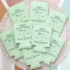 six mint green matchboxes sitting on top of a white plate