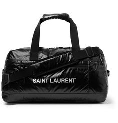 SAINT LAURENT's duffle is smart enough to take to the office and works just as well at the gym, thanks to durable glossed nylon, webbing handles and padded shoulder strap. It's printed with the house's bold moniker in silver and features a handy zipped pocket for your wallet, earphones and keys. Black Glossy Travel Bags, Duffle Bag For Men, Saint Laurent Collection, Mens Duffle Bag, Bagged Milk, Mens Style, At The Gym, Mens Fashion Trends, Black Logo