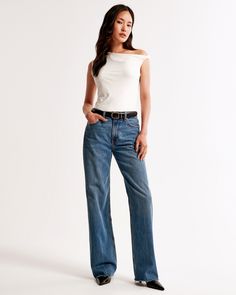 Step into the nostalgia of the early 2000s with Abercrombie & Fitch's Women's High Rise Loose Jeans. These jeans are a modern twist on a classic style, perfect for those who value both comfort and fashion.

- Size: 30 X-SHORT
- Color: Dark with Raw Hem
- Material: Body - Cotton, Lyocell; Pocket Bag - Various materials
- Gender: Female
- Fit: High rise (10.5” rise), relaxed at the waist and hips, loose full-length leg
- Features: Lightweight rigid denim, super soft authentic cotton fabric with no Dark Wash Short Length Cotton Jeans, Fitted Dark Wash Short-length Jeans, Dark Wash High Rise Cotton Jeans, Dark Wash Short Jeans With Button Closure, Abercrombie Ultra High Rise Vintage Flare Jeans, Dressy Jeans, Early 2000s Fashion, Denim Cotton, Loose Jeans