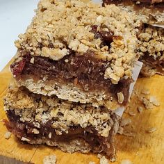 three pieces of chocolate and oatmeal bars stacked on top of each other