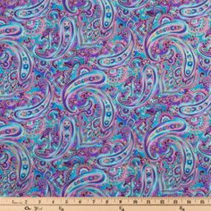 an abstract purple and blue background with lots of small swirls on the bottom half of it