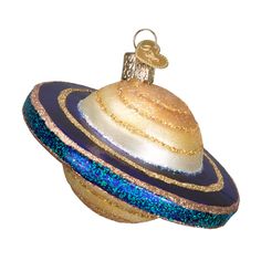 an ornament shaped like the planet saturn, with gold and blue glitter on it