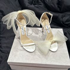 100% Authentic Jimmy Choo Heels Worn Once For Only 3hrs! Heels Are In Great Condition And Come With Original Box And Dust Bag For Each Heel. These Are The Perfect Bridal Shower, Engagement Party, Bachelorette, Wedding Day Shoe Showstopper! Received Endless Compliments! Asymmetric Mesh Fascinator Bows Ankle Fastening Open Toe Leather Lined Heel Height Measures: 100mm/3.9 Inches Made In Italy Fits Small To Size. Recommend Taking A Size Larger Jimmy Choo Aveline, Italy Fits, Jimmy Choo Heels, Party Bachelorette, Bridal Heels, 3 Inch Heels, Jimmy Choo Shoes, Bridal Shoes, Engagement Party