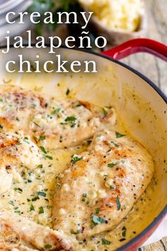 creamy jalapeno chicken in a red skillet