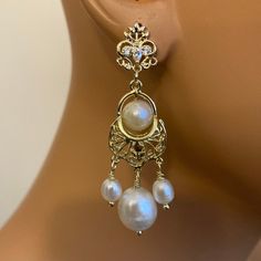 Long Pearl Earrings Real Freshwater pearls in gold chandelier 18th Century Georgian earrings Historical jewelry Dangerous Liaisons movie wedding earrings Victorian Earrings Antique Vintage style romantic wedding jewelry with real pearls. I made these earrings using real pearls that have a creamy white color. I then wire wrapped them to a beautiful filigree chandelier dangle. The Earrings are so pretty and delicate and wonderful movement. They have a pretty marquise rhinestone on the filigree ear Georgian Earrings, Victorian Earrings Antiques, 18th Century Jewelry, Real Pearl Earrings, Jewelry Victorian, Long Pearl Earrings, Victorian Earrings, Pretty Accessories, Gold Chandelier Earrings