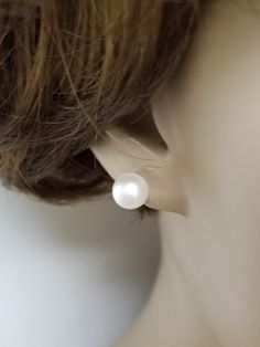 "Thanks for shopping our vintage estate store. We tend to sell well below wholesale and truly hope you enjoy all of our items. Many of the items are one of a kind, so please enjoy scrolling through the pictures and hopefully something will catch your eye. Brown spots are from camera. Nice estate 14k white gold natural Akoya pearl studs. Freshwater cultured pearls, custom made for our store. Retailed: $389 on sale $156 Size: 7mm 1/4\" Weight: 1.30 grams Earring backs are included. Freshwater pear Classic Round Hypoallergenic Clip-on Earrings, Classic White Clip-on Pearl Earrings, Classic White Gold Clip-on Earrings For Formal Occasions, Classic Pearl Drop Clip-on Earrings, Classic Pearl White Jewelry With Matching Earrings, Classic White Jewelry With Classic Design, Classic Pearl Earrings For Formal Occasions, Classic Formal Pearl Earrings, Classic Round Clip-on Earrings With Pearl Drop