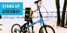 a person on a bike with the words stand up for fitness giveaway