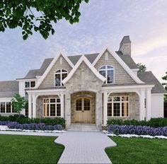 this is an artist's rendering of a house in the country style with stone and wood accents