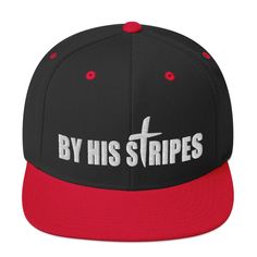 a black and red hat with the word melrose in white letters on it's side