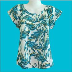 Really Cute! Blue Green "Carribean Sea" Blouse Type With 3 Buttons Sheer Material But Not See Through Cap Sleeves Size Small Petite New With Tags Great For Hot Summer Days Please See All Photos Welcome All Questions Thanks For Looking!! Short Sleeve Leaf Print Tops For Beach, Tropical Leaf Print Tops For Vacation, Casual Leaf Print Tops For Vacation, Blue Vacation Top With Palm Tree Print, Tropical Blue Tops With Tropical Print, Blue Tropical Print Tops, Blue Tropical Print Blouse For Beach, Blue Palm Tree Print Top For Vacation, Blue Palm Tree Print Tops For Beach Season