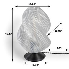 an image of a table lamp with measurements for the bulb and wire on it's base