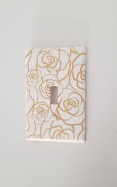 Gold Outlined Roses pattern with white background on Light Switch Gold Light Switch, Neutral Room Decor, Gold Nursery Decor, Rose Gold Lights, Gold Nursery, Roses Pattern, Light Switches, Elegant Feminine, Neutral Walls