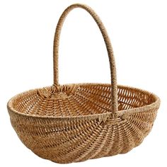 a wicker basket is shown on a white background, with the handle extended up