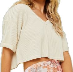 Trendy Knit V-neck Crop Top, Ribbed V-neck Top With Relaxed Fit, Knit V-neck Crop Top For Day Out, Fall Trendy V-neck Crop Top, V-neck Cropped Sweater For Spring, V-neck Knit Top For Loungewear, Cropped Top With Ribbed Waistband For Fall, Cropped Tops With Ribbed Waistband For Fall, Fall Cropped Tops With Ribbed Waistband