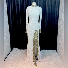 Sherri Hill 53007 White/Gold. New With Tags. Never Worn Or Altered. Luxury Long Sleeve White Dress, Luxury White Floor-length Dress, Luxury White Long Sleeve Dress, Luxury White Party Gown, Luxury Fitted White Dress, Luxury White Formal Gown, White Embellished Long Sleeve Gown, White Fitted Formal Evening Dress, White Long Sleeve Cocktail Gown