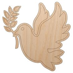 a wooden cutout of a dove with an olive branch