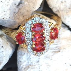 Natural Rubies Totaling >1.2cts Are Set In This Lovely 9k Yellow Gold Cluster Ring (Size 9) Imported From The Uk. Natural Zircon (Not Cz!) Accents. This Is An Extremely Limited Edition Item, Only 25 Were Sold! The Genuine Ethically Sourced Gemstones Were Heated But The Rubies Have Not Been Fissure-Filled. These Tanzanian Rubies Have A More True Red Color Than The Pinkish Red Often Seen In Rubies Set In Jewelry. Shop With Confidence, I'm A Certified Gemologist! Classic Red Cluster Diamond Ring, Red Baguette Cut Diamond Accent Rings, Red Diamond Cluster Ring With Vvs Clarity, Red Diamond Ring With Accents, Red Marquise Cut Gemstone Cluster Ring, Dazzling Red Diamond Ring With Diamond Accents, Dazzling Red Diamond Ring With Accents, Red Marquise Cut Cluster Ring, Classic Ruby Ring With Diamond Accents In Cluster Shape