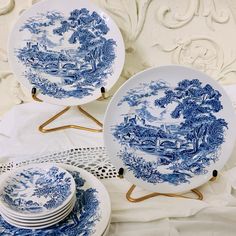 blue and white plates are stacked on top of each other