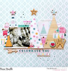 a scrapbook page with an image of a child's photo and christmas trees