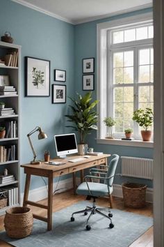 a home office with blue walls and wooden floors