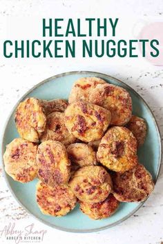 healthy chicken nuggets on a plate with text overlay that reads healthy chicken nuggets