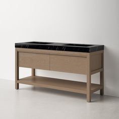 a wooden table with two planters on it and a shelf below the top that holds plants