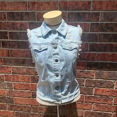 Women's BDG Urban Outfitters Light Blue Distressed Denim Vest Size Small. Blue Distressed Denim Jacket For Summer, Summer Blue Distressed Denim Jacket, Summer Distressed Washed Blue Denim Jacket, Light Wash Distressed Denim Jacket For Summer, Summer Distressed Denim Vest, Fitted Ripped Denim Vest, Casual Light Wash Distressed Denim Vest, Casual Ripped Denim Vest, Ripped Denim Vest Casual Style