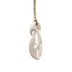 Handmade Maori Unity Twist pendant with with engraved carvings. This Twist has a modern style blending elements from the Hai-Matau and the Koru which represent prosperity, new life and peace. The Twist with its crossing design represents the many paths of life and love, as such is regarded as the original eternity symbol. A single Twist shows the joining together of two people for eternity while the double and triple twists have a similar meaning but refer more to the joining of two peoples or c Traditional White Carved Necklaces, Artisan Carved White Necklace, Symbolic White Medallion Necklace, Handmade Symbolic White Necklace, White Carved Pendant Necklaces, White Carved Pendant Necklace, White Carved Amulet Necklace, White Symbolic Pendant Necklace, Artisan White Engraved Necklace