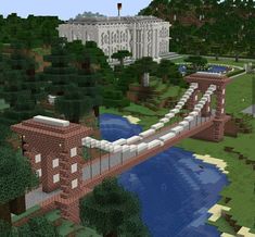 a bridge over a body of water in front of a large white house and trees