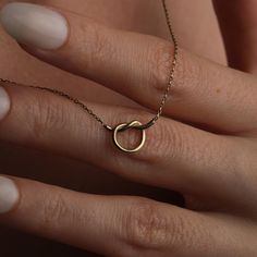 ✨ Introducing our exquisite Knot Necklace, crafted from high-quality 14K solid gold. This beautifully designed piece features a delicate knot pendant that symbolizes unity and love, making it a timeless addition to any jewelry collection. Available in white gold, gold, and rose gold, this necklace offers versatility in style and length to perfectly suit your personal taste. 🌟 💖 Meaningful & Versatile: Not only is our Knot Necklace a stunning accessory, but it also serves as a meaningful keepsa Elegant Necklace In Polished Recycled Gold, Adjustable 14k Gold Necklace For Anniversary, Adjustable 14k Gold Anniversary Necklace, Yellow Gold Wedding Necklaces, Elegant Recycled Gold Necklaces As Gift, Elegant Recycled Gold Necklaces For Gift, Gold Plated Necklace With Polished Finish As Gift, Adjustable Yellow Gold Necklace For Anniversary, Gold Plated Necklace With Polished Finish For Gifts