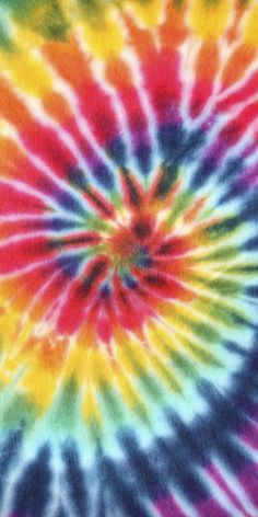 a colorful tie - dyed background with many colors