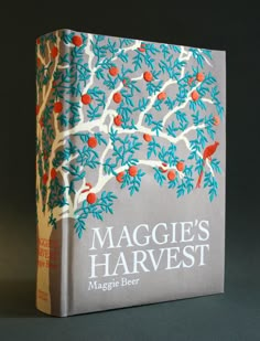 a book with an orange tree on the cover