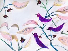 two purple birds sitting on top of a leafy branch with leaves and flowers in the background