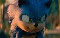 sonic the hedgehog is looking into the camera