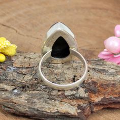 Pear Eudialyte Ring, Pear Stone Ring, Statement Ring, Gemstone Cabochon, 925 Sterling Silver, Birthday Gifts, Christmas Sale, Etsy Sale,Boho Description : Gemstone : Eudialyte Metal : 925 Sterling Silver Stone Shape :- Pear Stamp :- 925 Weight : 6.53 Gram Approx Stone Size : 23 x 15 MM Approx handmade Item Made to order **This ring you will receive may vary from the image as no two gemstones are similar and images cannot define exact product definitions. ** Shipping Policy:- We mainly use UPS , Adjustable Pear-shaped Anniversary Ring, Teardrop Stone Setting Ring For Anniversary, Adjustable Pear-shaped Ring For Gift, Teardrop 925 Stamped Rings For Anniversary, Pear-shaped Cabochon Ring As Gift, Teardrop Shaped Anniversary Rings Stamped 925, Anniversary Teardrop Ring Stamped 925, Sterling Silver Pear-shaped Gemstone Ring, Unique Silver Pear-shaped Rings