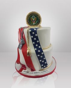 a cake decorated with an american flag and the seal of the united states on top