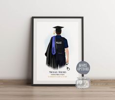 a framed poster with an image of a police officer wearing a graduation cap and gown