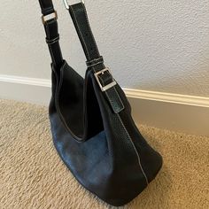 The Hard To Find Rare Black Taylor Hobo Is Made Of Natural Grain Italian Leather With Palladium-Plated Solid Brass Hardware. Tiffany Blue Leather Lining With Three Small Interior Pockets, A Zipper Compartment And A Key Ring. Magnetic Closure. Single Adjustable Shoulder. Original Owner. Light Use. Exterior Leather Looks Brand New, Interior Light Blue Lining Has Some Markings, Easily Cleaned. Look At All Pics. Appx. 12.5”X6”X11” With A 11” Adjustable Drop At Its Longest Point. Designer Rectangular Hobo Bag With Silver-tone Hardware, Formal Hobo Tote Bag With Silver-tone Hardware, Classic Hobo Bag With Silver-tone Hardware And Double Handle, Designer Hobo Bag With Silver-tone Hardware For Formal Occasions, Designer Formal Hobo Bag With Silver-tone Hardware, Classic Hobo Bag With Silver-tone Hardware For Everyday Use, Double Handle Shoulder Bag With Silver-tone Hardware For Errands, Travel Hobo Bag With Silver-tone Hardware And Top Handle, Travel Hobo Bag With Silver-tone Hardware