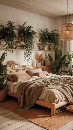 a bedroom with lots of plants in the corner