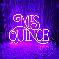 a neon sign that says miss quince in front of a purple background with curtains