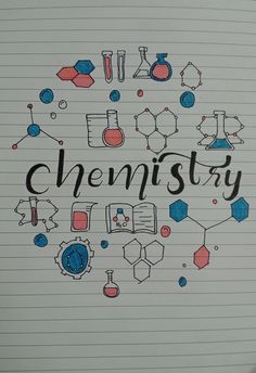 a notebook with the words chemistry written on it and various science related objects around it