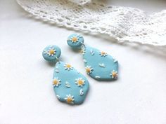 Very delicate light blue earrings with small daisies will be nice addition to summer outfits.Earrings are made from polymer clay. Size Blue Teardrop Jewelry For Spring, Light Blue Drop Earrings For Summer, Handmade Light Blue Drop Flower Earrings, Blue Dangle Flower Earrings For Spring, Cute Blue Polymer Clay Earrings, Blue Dangle Flower Earrings In Polymer Clay, Handmade Turquoise Earrings For Spring, Cute Handmade Light Blue Earrings, Blue Flower Earrings For Summer