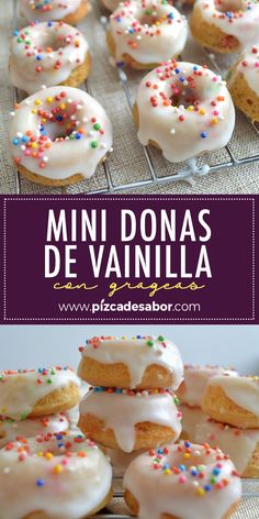 mini donuts with white frosting and sprinkles on a cooling rack