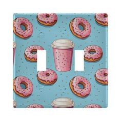 a light switch cover with doughnuts and a cup of coffee on blue background